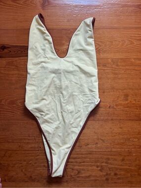 Yellow One-Piece Swimsuit with Brown Trim